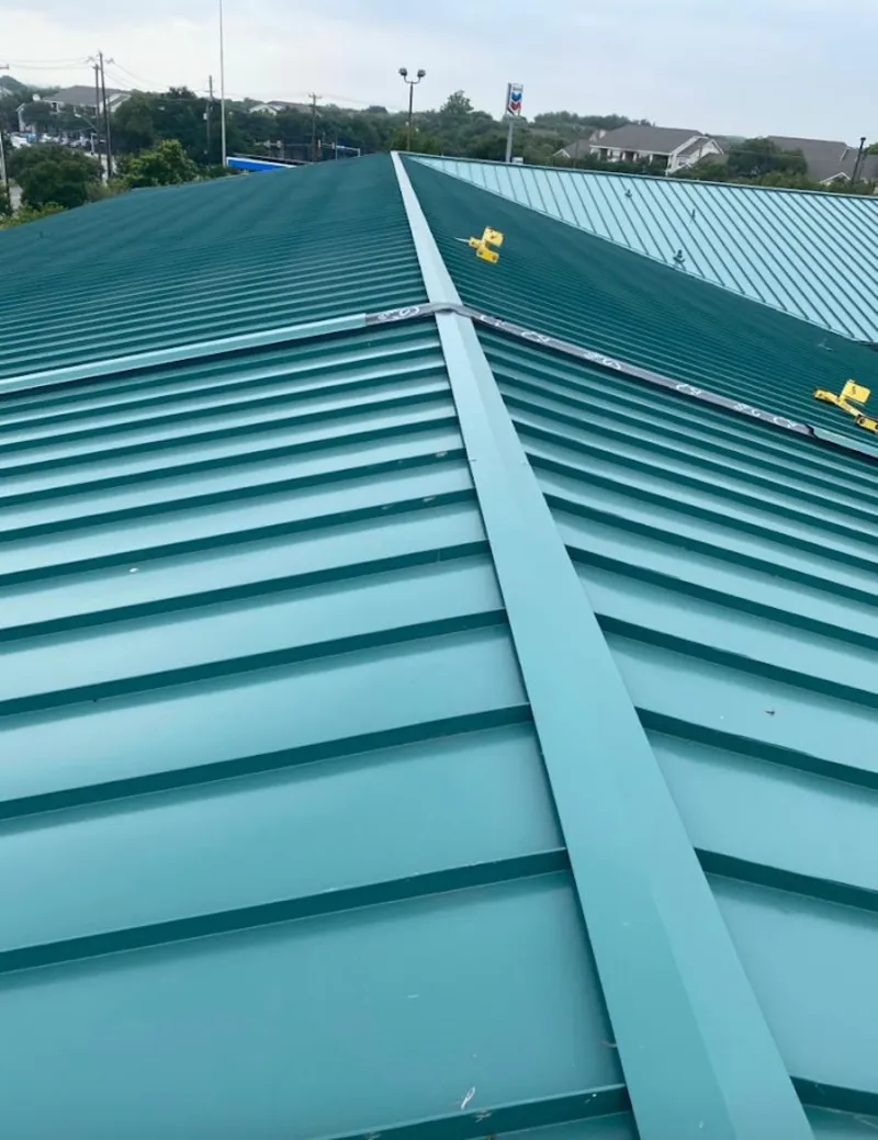 Green commercial metal roof ridge and valley for Metal Roof Repair in Ballenger Creek